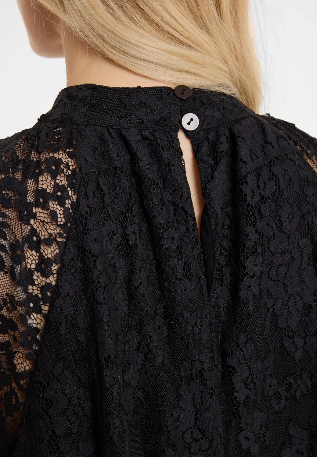 Ana Alcazar Abidy abito pizzo nero midi volant