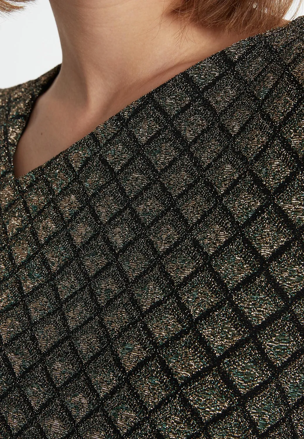 Ana Alcazar Sakyra abito lurex nero oro scollatura asimmetrica