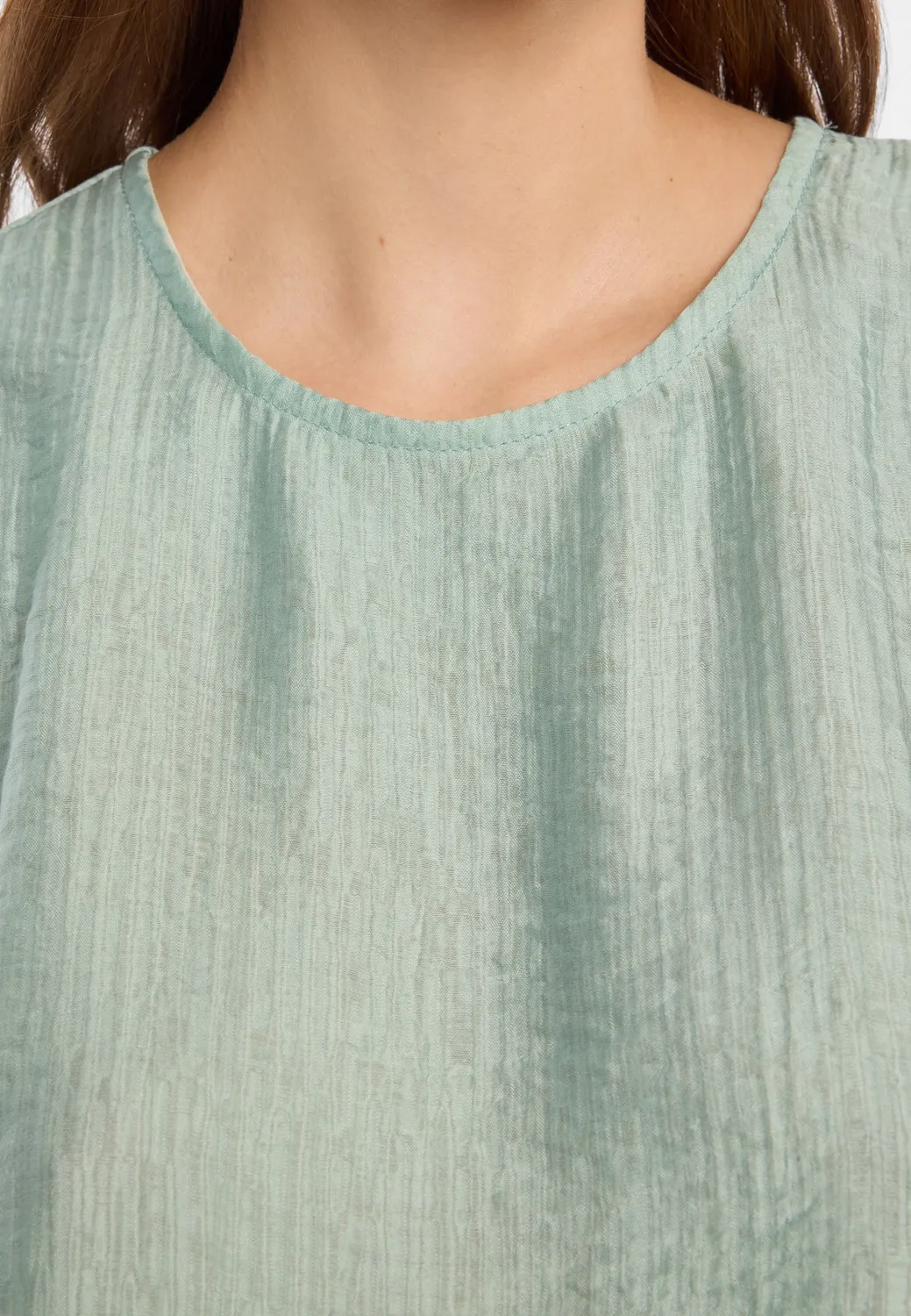 Ana Alcazar Dorell top peplum verde salvia