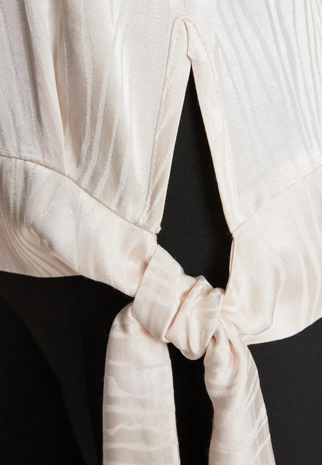 Ana Alcazar Zarla top raso avorio con fiore